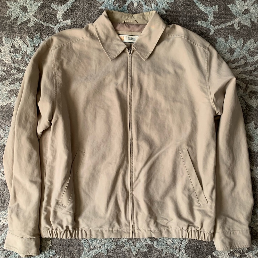 Tan sweater, size is Large.